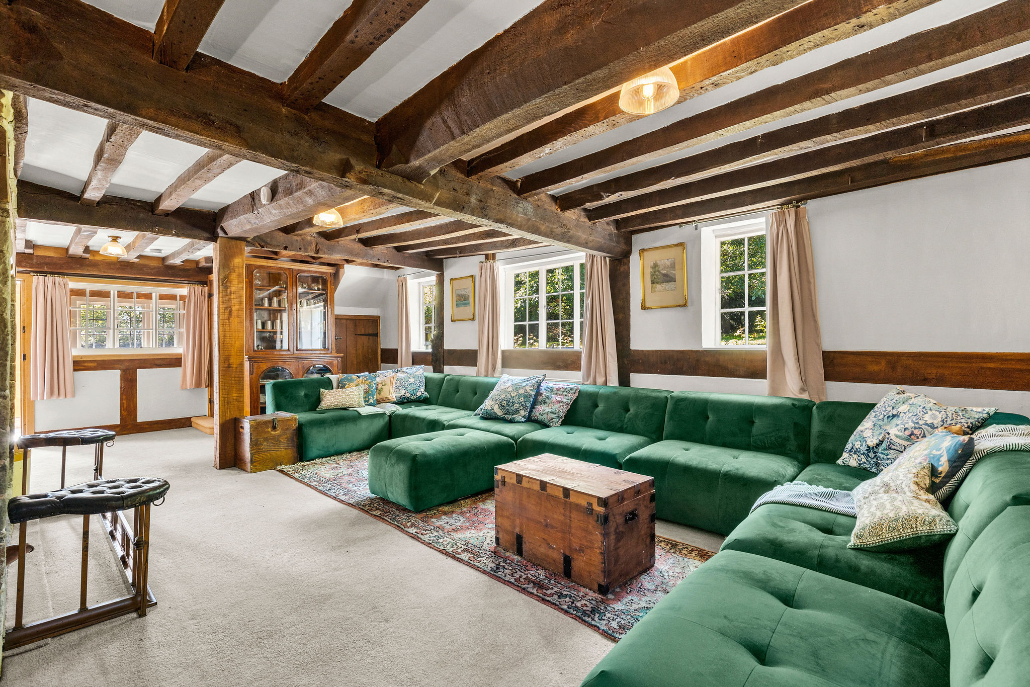 Taylor's Meadow — green sofa lounge after Becky's redesign