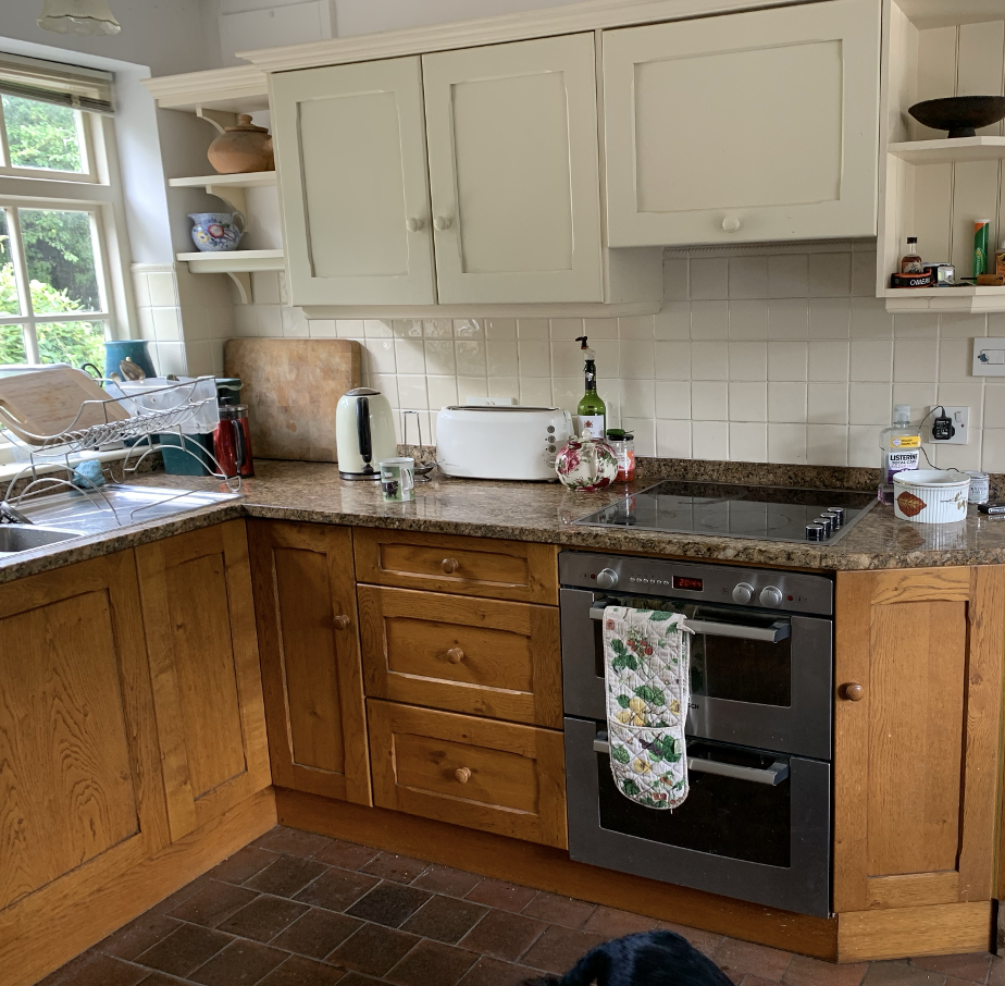 Before: mismatched wooden kitchen cabinets before transformation, Shropshire
