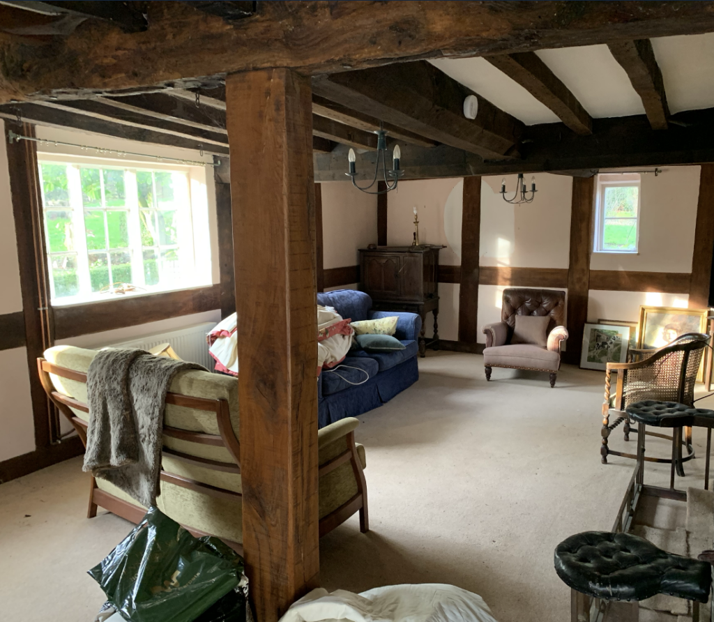 Before: Grade 2 listed , heavy beamed , dark living room before transformation, Shropshire