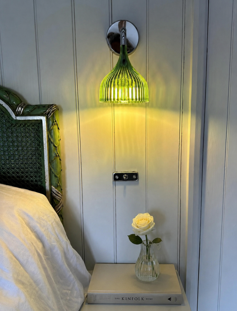Tongue and grove wood panelled bedroom wall with discrete wall light and switch, Shropshire