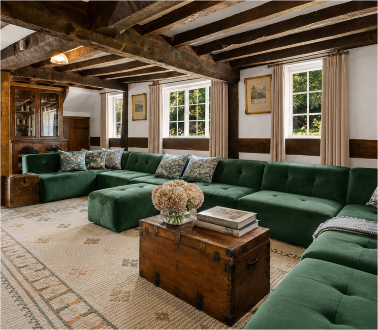 A bold sofa colour to lift the room with dark beams, Shropshire