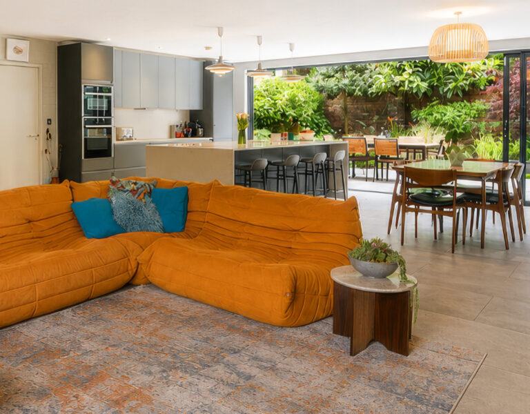 Mid century modern open plan living room. Ligne Rosset Toga sofa, Stockport
